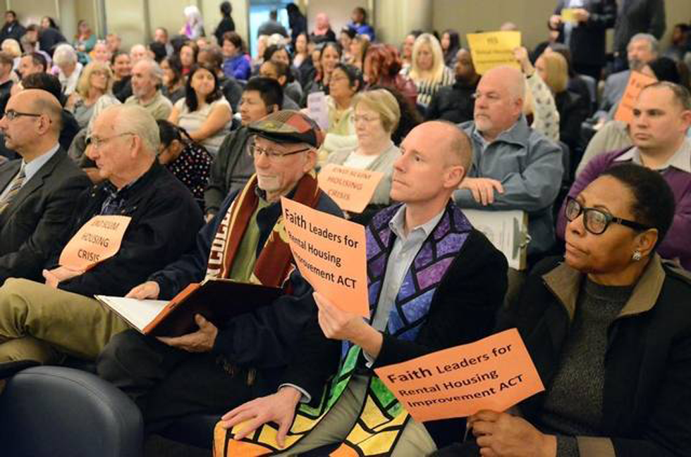 Faith leaders listen as Fresno Mayor Lee Brand presents his Rental Housing Improvement Act proposal.