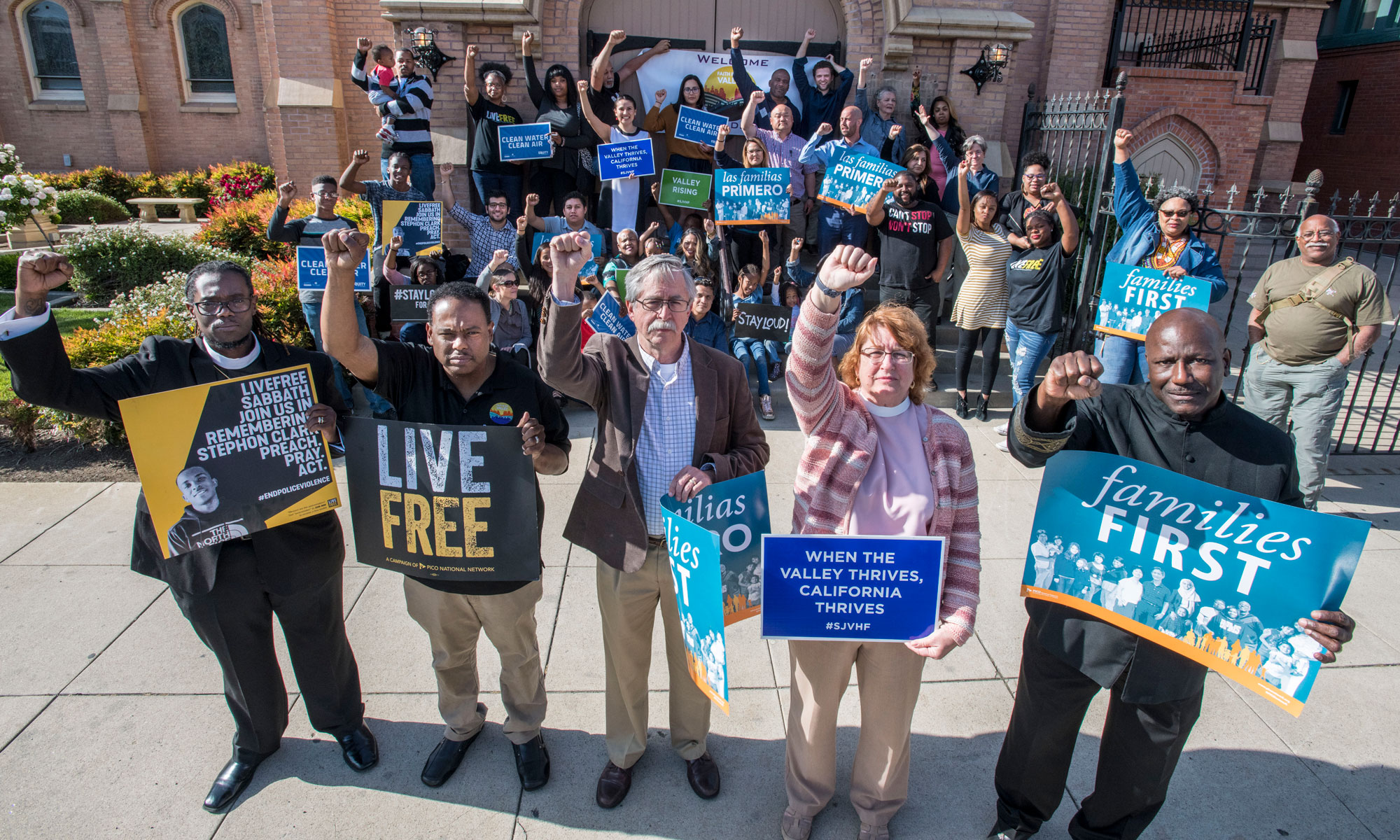 Faith in the Valley hero - leaders with fists raised